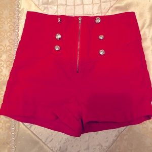 High waisted red shorts with from buttons